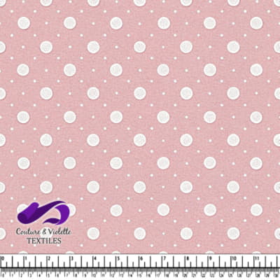Pink fabric with white polka dots pattern